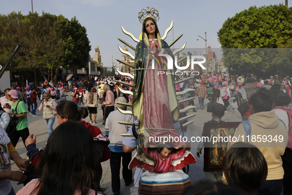 Pilgrims from different states of the Mexican Republic attend the Basilica of Guadalupe in Mexico City, Mexico, on December 11, 2024, for th...