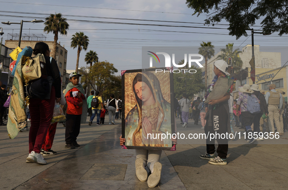 Pilgrims from different states of the Mexican Republic attend the Basilica of Guadalupe in Mexico City, Mexico, on December 11, 2024, for th...