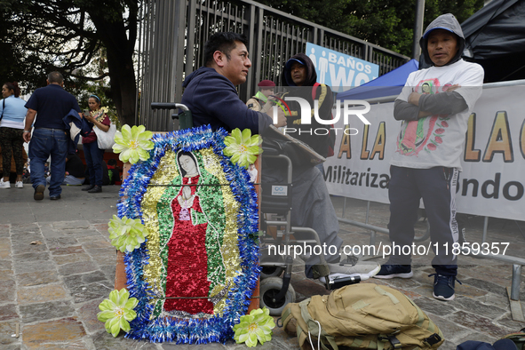 Pilgrims from different states of the Mexican Republic attend the Basilica of Guadalupe in Mexico City, Mexico, on December 11, 2024, for th...