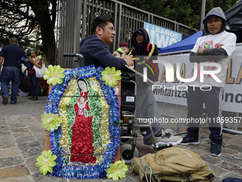 Pilgrims from different states of the Mexican Republic attend the Basilica of Guadalupe in Mexico City, Mexico, on December 11, 2024, for th...