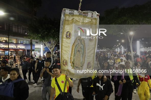 Pilgrims from different states of the Mexican Republic attend the Basilica of Guadalupe in Mexico City, Mexico, on December 11, 2024, for th...