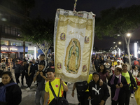 Pilgrims from different states of the Mexican Republic attend the Basilica of Guadalupe in Mexico City, Mexico, on December 11, 2024, for th...