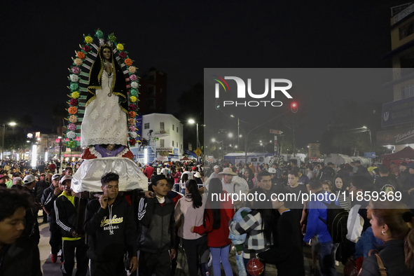 Pilgrims from different states of the Mexican Republic attend the Basilica of Guadalupe in Mexico City, Mexico, on December 11, 2024, for th...