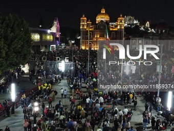 Thousands of Catholic pilgrims arrive at the Basilica of Guadalupe for the religious celebration of the Virgin of Guadalupe Day in Mexico Ci...