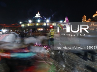 Thousands of Catholic pilgrims arrive at the Basilica of Guadalupe for the religious celebration of the Virgin of Guadalupe Day in Mexico Ci...