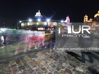 Thousands of Catholic pilgrims arrive at the Basilica of Guadalupe for the religious celebration of the Virgin of Guadalupe Day in Mexico Ci...