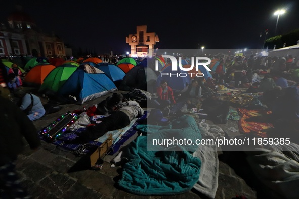 Thousands of Catholic pilgrims arrive at the Basilica of Guadalupe for the religious celebration of the Virgin of Guadalupe Day in Mexico Ci...