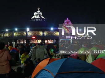 Thousands of Catholic pilgrims arrive at the Basilica of Guadalupe for the religious celebration of the Virgin of Guadalupe Day in Mexico Ci...