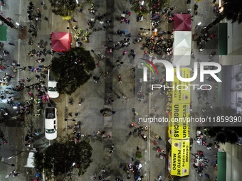 Thousands of Catholic pilgrims arrive at the Basilica of Guadalupe for the religious celebration of the Virgin of Guadalupe Day in Mexico Ci...