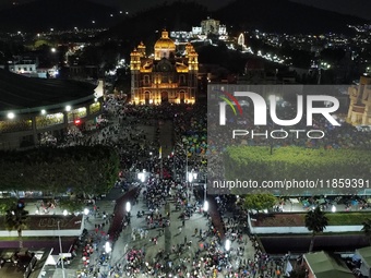 Thousands of Catholic pilgrims arrive at the Basilica of Guadalupe for the religious celebration of the Virgin of Guadalupe Day in Mexico Ci...