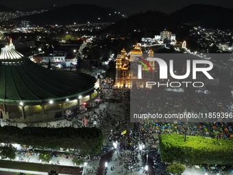 Thousands of Catholic pilgrims arrive at the Basilica of Guadalupe for the religious celebration of the Virgin of Guadalupe Day in Mexico Ci...