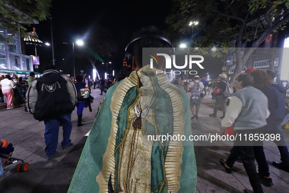 Thousands of Catholic pilgrims arrive at the Basilica of Guadalupe for the religious celebration of the Virgin of Guadalupe Day in Mexico Ci...