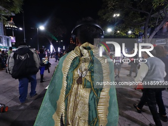 Thousands of Catholic pilgrims arrive at the Basilica of Guadalupe for the religious celebration of the Virgin of Guadalupe Day in Mexico Ci...