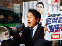 Progressive Party National Assembly Member Yoon Jong-oh delivers a speech calling for the immediate arrest of President Yoon Suk-yeol. Progr...