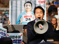 Progressive Party National Assembly Member Yoon Jong-oh delivers a speech calling for the immediate arrest of President Yoon Suk-yeol. Progr...