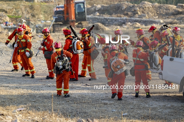 A comprehensive combat drill for forest fire emergency response takes place in Qingdao, China, on December 11, 2024. 