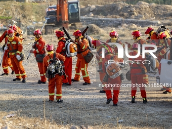 A comprehensive combat drill for forest fire emergency response takes place in Qingdao, China, on December 11, 2024. (