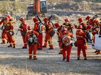 A comprehensive combat drill for forest fire emergency response takes place in Qingdao, China, on December 11, 2024. (