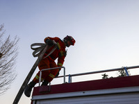 A comprehensive combat drill for forest fire emergency response takes place in Qingdao, China, on December 11, 2024. (