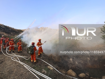 A comprehensive combat drill for forest fire emergency response takes place in Qingdao, China, on December 11, 2024. (