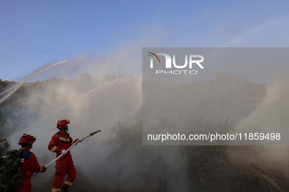 A comprehensive combat drill for forest fire emergency response takes place in Qingdao, China, on December 11, 2024. 