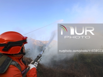 A comprehensive combat drill for forest fire emergency response takes place in Qingdao, China, on December 11, 2024. (