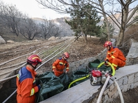 A comprehensive combat drill for forest fire emergency response takes place in Qingdao, China, on December 11, 2024. (