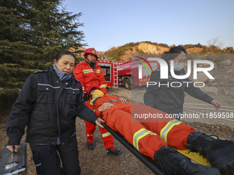 A comprehensive combat drill for forest fire emergency response takes place in Qingdao, China, on December 11, 2024. (