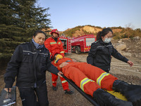 A comprehensive combat drill for forest fire emergency response takes place in Qingdao, China, on December 11, 2024. (