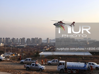 A comprehensive combat drill for forest fire emergency response takes place in Qingdao, China, on December 11, 2024. (