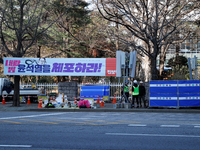 Telecommunications company employees install additional communication antennas around the National Assembly area in Yeouido, Seoul, South Ko...