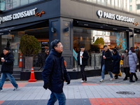 A cafe next to the People Power Party's central headquarters in Yeouido, Seoul, South Korea, on December 12, 2024, sees a citizen prepay KRW...