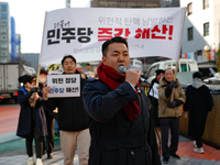 A small group of President Yoon Suk-yeol's supporters, primarily elderly individuals, holds a rally in front of the People Power Party's cen...