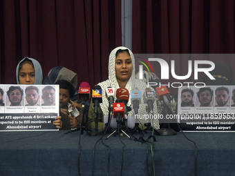 A family member of M.R.F. Shakeena, the wife of Mohammed Nafran (35), speaks at a media conference in Colombo, Sri Lanka, on December 12, 20...