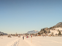 People walk through the snowy landscape near Bavarian Oberstdorf in Bavaria, Swabia, Oberallgau, Germany, on January 20, 2024. Oberstdorf is...