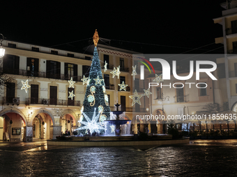 Christmas lights and a tree adorn the main square in Cava de'Tirreni, Salerno, Italy, on December 11, 2024. (