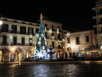 Christmas lights and a tree adorn the main square in Cava de'Tirreni, Salerno, Italy, on December 11, 2024. (