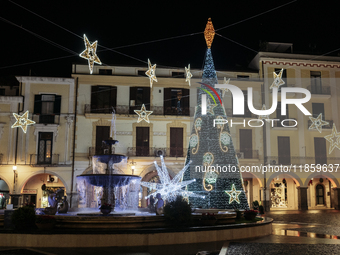 Christmas lights and a tree adorn the main square in Cava de'Tirreni, Salerno, Italy, on December 11, 2024. (