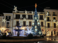 Christmas lights and a tree adorn the main square in Cava de'Tirreni, Salerno, Italy, on December 11, 2024. (