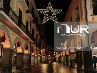 Christmas lights adorn the arcades and the city center in Cava de'Tirreni, Salerno, Italy, on December 11, 2024. (