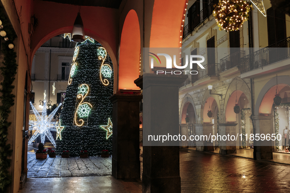 Christmas lights adorn the arcades and the city center in Cava de'Tirreni, Salerno, Italy, on December 11, 2024. 