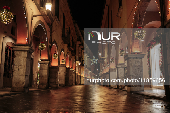 Christmas lights adorn the arcades and the city center in Cava de'Tirreni, Salerno, Italy, on December 11, 2024. 