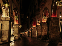 Christmas lights adorn the arcades and the city center in Cava de'Tirreni, Salerno, Italy, on December 11, 2024. (