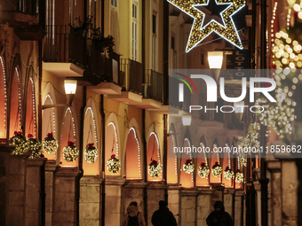 Christmas lights adorn the arcades and the city center in Cava de'Tirreni, Salerno, Italy, on December 11, 2024. (