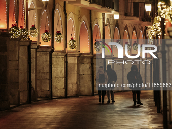 Christmas lights adorn the arcades and the city center in Cava de'Tirreni, Salerno, Italy, on December 11, 2024. (