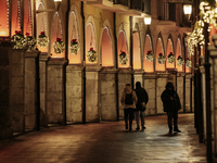 Christmas lights adorn the arcades and the city center in Cava de'Tirreni, Salerno, Italy, on December 11, 2024. (