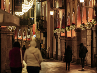 Christmas lights adorn the arcades and the city center in Cava de'Tirreni, Salerno, Italy, on December 11, 2024. (