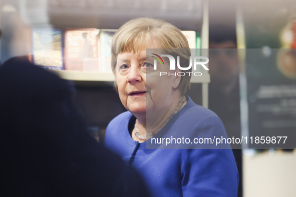 Former German Chancellor Angela Merkel attends the presentation of her book Liberta at Rizzoli Galleria in Milan, Italy, on December 11, 202...