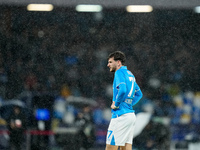 Khvicha Kvaratskhelia of SSC Napoli reacts in the rain during the serie Serie A Enilive match between SSC Napoli and SS Lazio at Stadio Dieg...