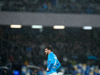 Khvicha Kvaratskhelia of SSC Napoli reacts in the rain during the serie Serie A Enilive match between SSC Napoli and SS Lazio at Stadio Dieg...